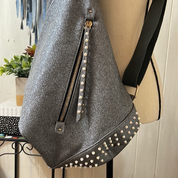 Metallic silver and multi color stud fold over backpack. Vegan leather. - Picture 2 of 5